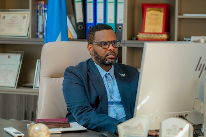 Dr Abdulrazaq Yusuf Ahmed at his desk